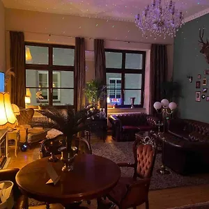 https://wunderschones-herrenzimmer-loft-in-der-innenstadt.getmunichhotels.com